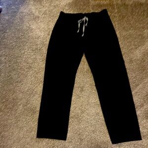 Figs scrub bottoms size medium, small discoloration on bottom leg as pictured